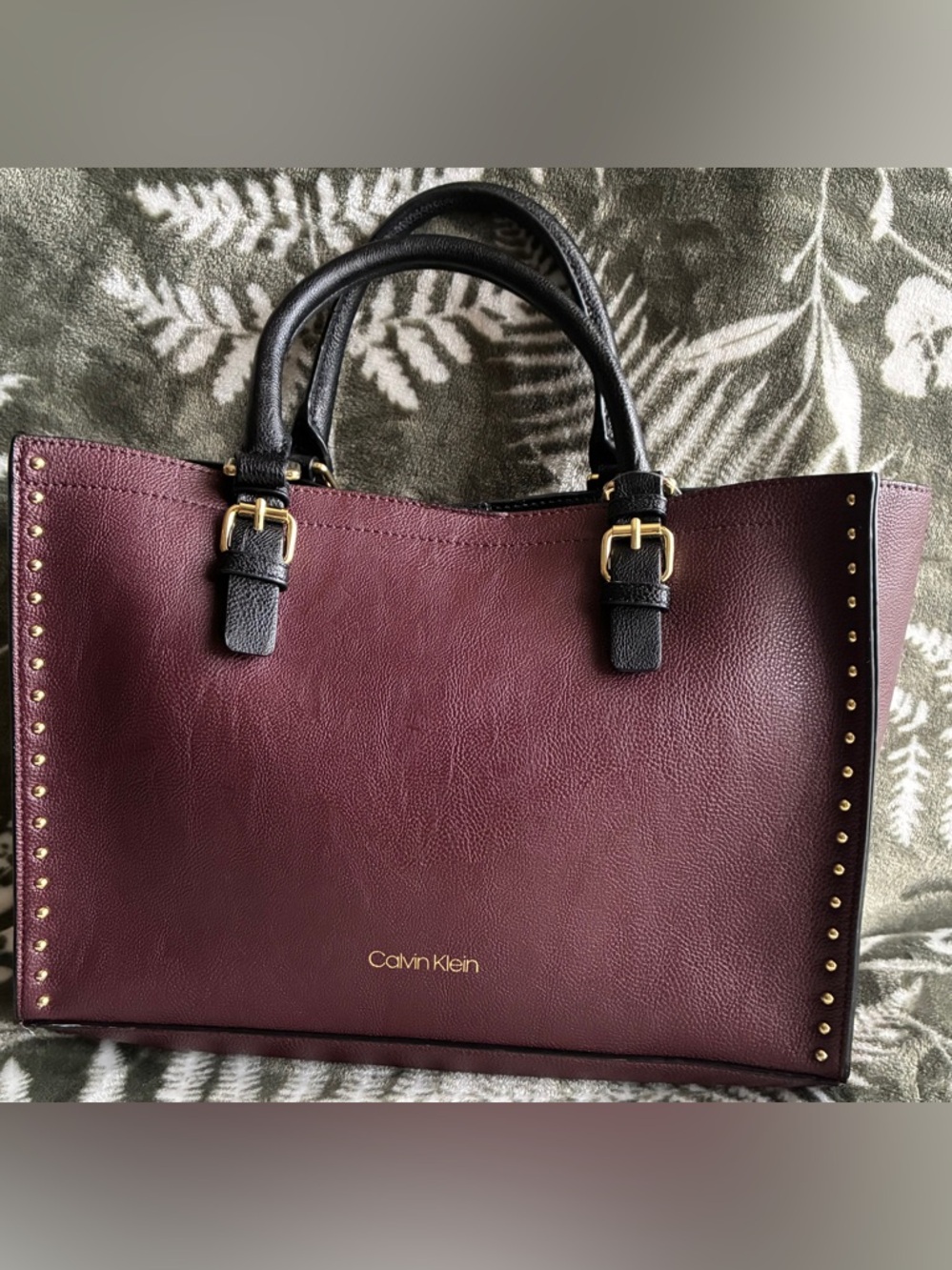 Calvin Klein burgundy Tote with Black Handles and Gold Accents